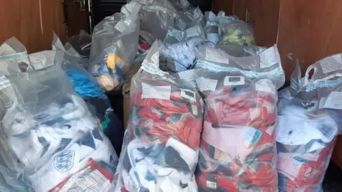 City of London Police Fake football shirts in the back of a van