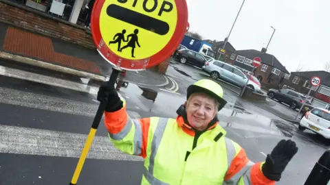 Middlesbrough Council Elaine Dunn with her lollipop lady sign