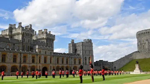 Reuters Guardsmen mark Britain"s Queen Elizabeth"s official birthday at Windsor Castle