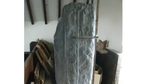 MANX LOTTERY TRUST Viking-era standing stone in Malew Church