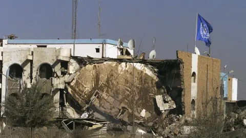 Getty Images The aftermath of the bombing of the UN headquarters in Baghdad in August 2003