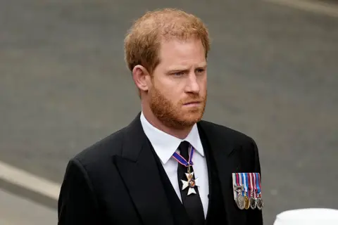 Getty Images Prince Harry, Duke of Sussex arrive at Westminster Abbey ahead of the State Funeral of Queen Elizabeth II on September 19, 2022 in London