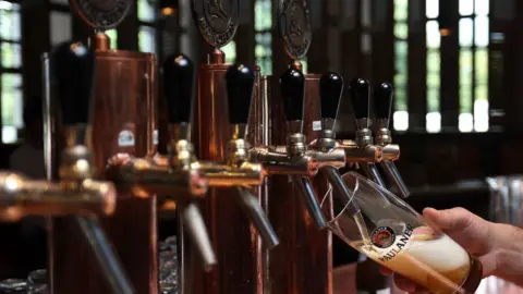 EPA-EFE/REX/Shutterstock Beer being poured