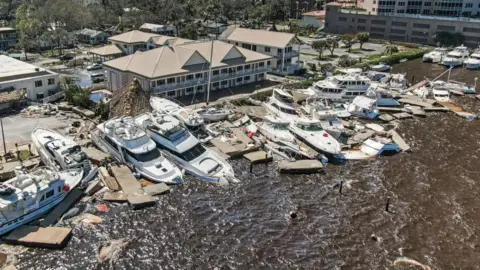 EPA An overhead image of damaged boats from Hurricane Ian.