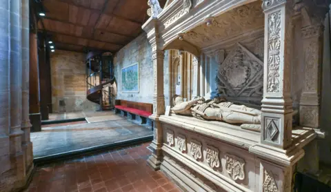 Josie Sturgess Mills Photography The Horsey monument pictured in its original location is a grand white marble tomb with statues of two men in battle armour laying side by side beneath an ornately carved canopy supported by four pillars.