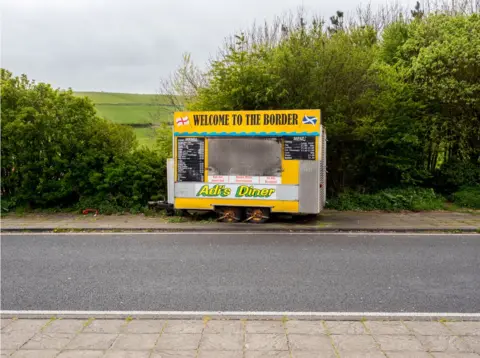 Peter Dench Adi's Diner situated at the border of England and Scotland.