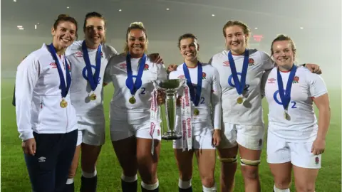 Getty Images England celebrate with the Six Nations Trophy in November.