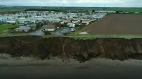 Cliff and homes