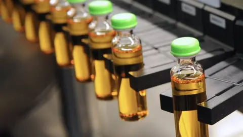 Getty Images A line of insulin vials at a manufacturing factory