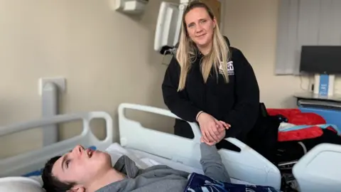 BBC Ollie Carroll with his mother Lucy