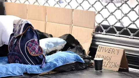 Getty Images Homeless sign