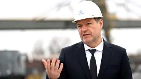 Getty Images German Minister of Economics and Climate Protection Robert Habeck speaks during a visit of the Thyssenkrupp Steel