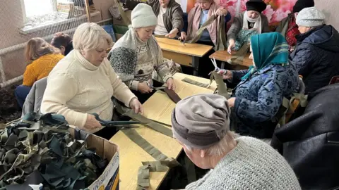 BBC/Scarlett Barter As US funding is held up, a growing army of volunteers in Ukraine help with the war effort