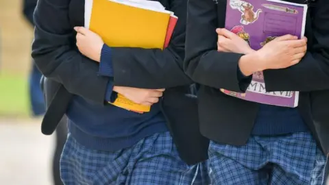 PA Media Girls in school uniform