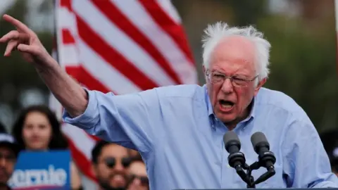 Getty Images Democratic US presidential candidate Senator Bernie Sanders speaks during a Get Out the Early Vote campaign rally in Santa Ana, California
