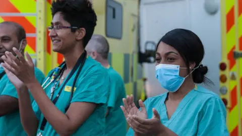 Getty Images NHS staff clapping