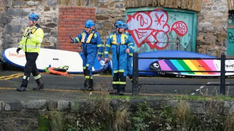 Martin Cavaney/Athena Pictures Emergency services crews at the scene on Saturday