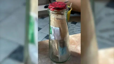 Laurette Burton Milk bottle time capsule