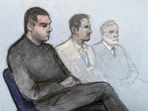 Elizabeth Cook/PA Wire A sketch shows a man in black sitting in the foreground. Two other men are sitting next to him further away and in paler clothes. 