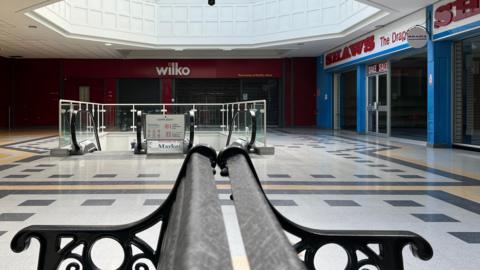 Empty shops including Wilcos and Shaws inside Castle Place