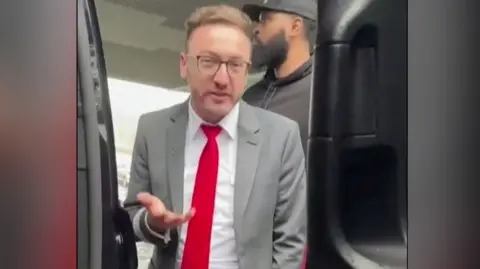 Airport worker  dressed successful  suit