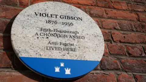 PA Media A plaque in Dublin commemorating the life of Violet Gibson