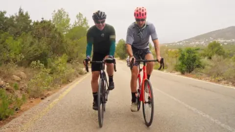 LeBlanq Pete Tong cycling with Taylor Phinney, a former World Tour rider, during a trip with LeBlanq Tours, which offers luxury cycling trips all over the world, which started with Ibiza