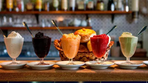 Getty Images Traditional Granita Siciliana, crushed ice with fruit, Alfredo's bars, Salina island, Aeolian Islands, Sicily, Italy, Europe. 