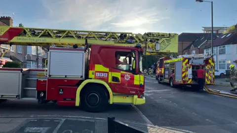 Two fire engines on a residential street