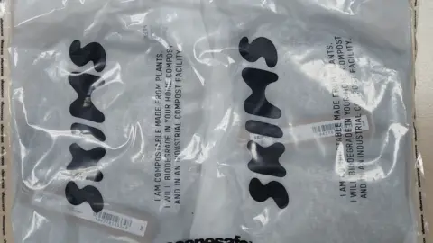NCA Plastic packages of Skims clothing seized by officers.