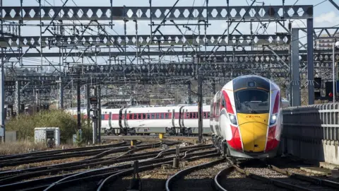 Peter Alvey Train arriving into a station