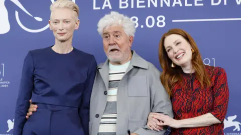 EPA Tilda Swinton (L), Spanish director and screenwriter Pedro Almodovar and US actor Julianne Moore pose at a photocall of 'The Room Next Door' at the 81st annual Venice International Film Festival, in Venice, Italy, 02 September 2024. The movie is presented in the official competition 'Venezia 81' at the festival running from 28 August to 07 September 2024.
81st Venice Film Festival, Italy 