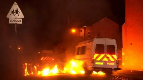 PA Media / HAYDN WEST Scene from Oldham riots
