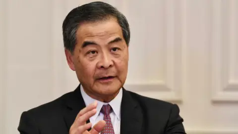 Getty Images Former Hong Kong chief executive Leung Chun-ying speaks to the media after a celebration of the 40th anniversary of the establishment of the Shenzhen Special Economic Zone on October 14, 2020 in Hong Kong, China.