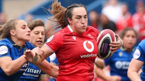 Courtney Keight on the charge for Wales