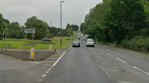 A general view of Ashbourne Road in Derby at the Prince Charles Avenue junction, showing a sign for the Mackworth estate.