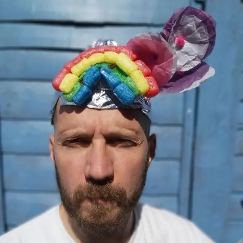 Jim Radford Jim Radford in a hat made by his daughter