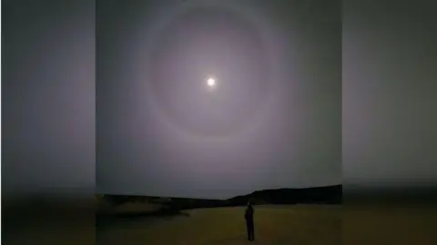 The lunar halo appeared over the beach in Cullercoats, North Tyneside