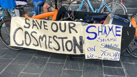 A sign reading "Save our Cosmeston" 