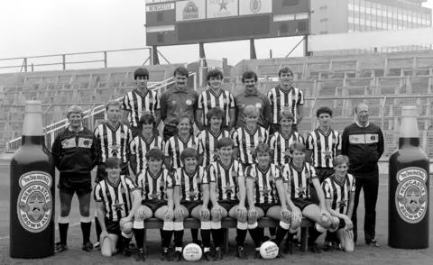 Danny Brannigan/Hulton Archive Newcastle United 1984/1985 team with brown ale sponsor