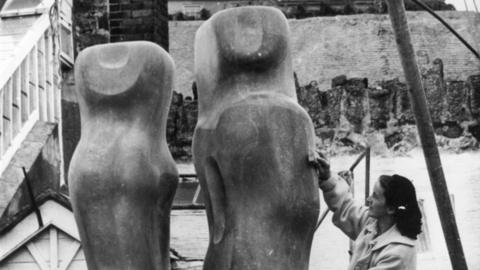 English sculptor Dame Barbara Hepworth at work on her sculptural piece 'Contrapuntal Forms'