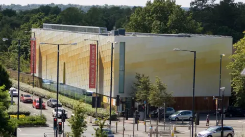 Getty Images An aerial image of the Lightbox Gallery and Museum in Woking. There are also cars, traffic lights and pedestrians on Victoria Way.