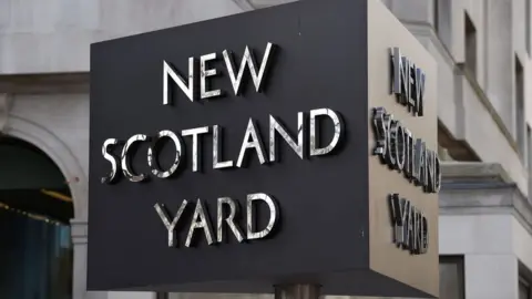 PA Media New Scotland Yard sign