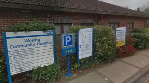 Google Signs at the entrance to Woking Community Hospital