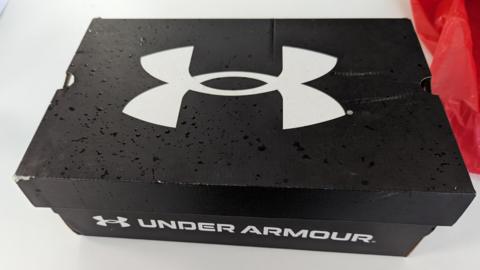Under Armour shoebox the puppies were found in