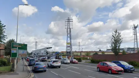 A Google Maps image showing lots of cars on the road. 