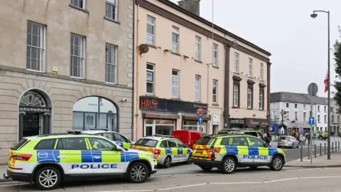 Pacemaker Police cars parked on High Street in Carrickfergus