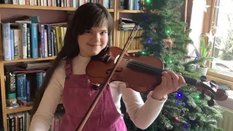 family handout Girl playing violin