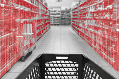 Getty Images A supermarket with binary code on the shelves