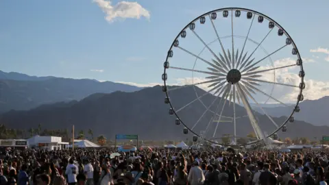 REUTERS/Daniel Cole People attend the Coachella Valley Music and Arts Festival in Indio, California, U.S., April 10, 2026. 